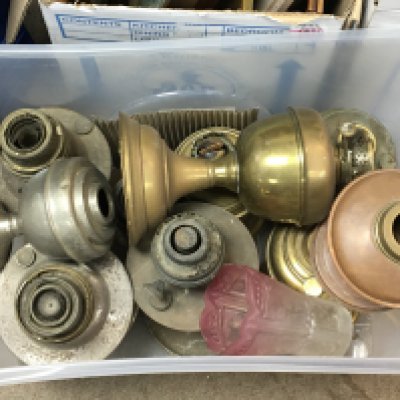 A collection of oil lamp bases and other associated items and oddments.