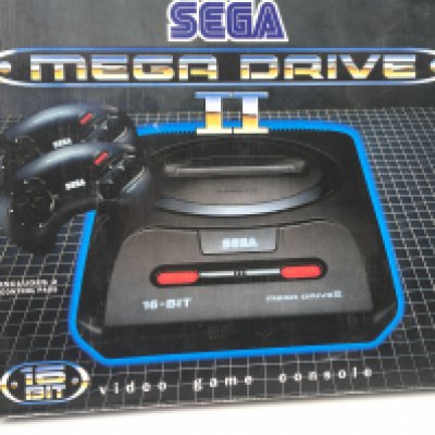A boxed SEGA Mega Drive II. 16 bit video game console. Includes power supply. Controller and cables. No reserve