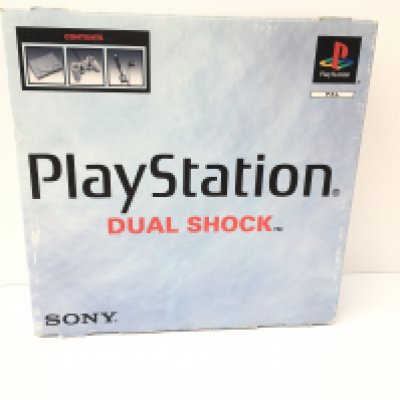 A boxed PlayStation Dual Shock console. Includes controller and cables. No reserve