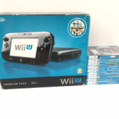 A boxed Nintendo Wii Premium pack. 32GB. Includes power supply..cables..manual and 9x boxed games discs. No reserve