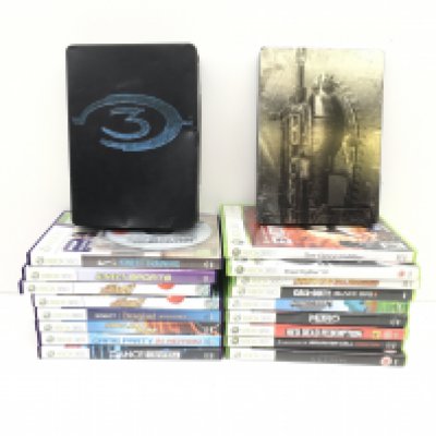 A collection of boxed XBOX 360 discs includes Gears of War and Halo3 in metal cases. No reserve