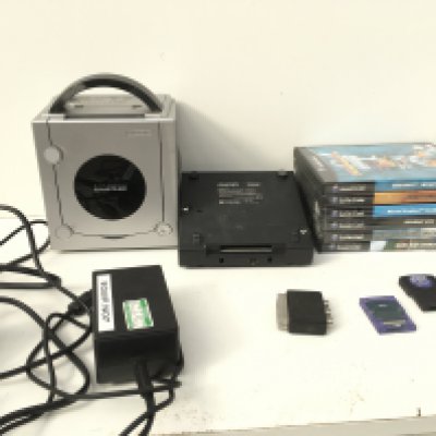 A Nintendo GameCube..includes gameboy player..power supply..memory cartridge and boxed games discs. No reserve.