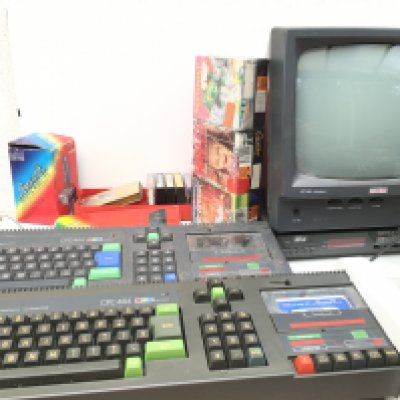 2x AMSTRAD CPC464 keyboards includes GT65 monitor..CT1 radio/ alarm..manual..cables ..joystick and games cassettes. No reserve