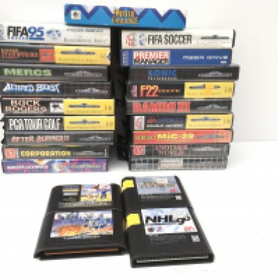 A collection in excess of 20 Sega Mega Drive games mostly boxed 4 loose. No reserve