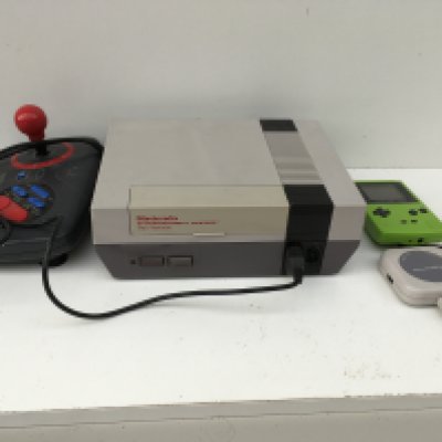 A Nintendo NES console plus joystick. A Nintendo Game boy colour plus a 4 player adapter. No reserve.