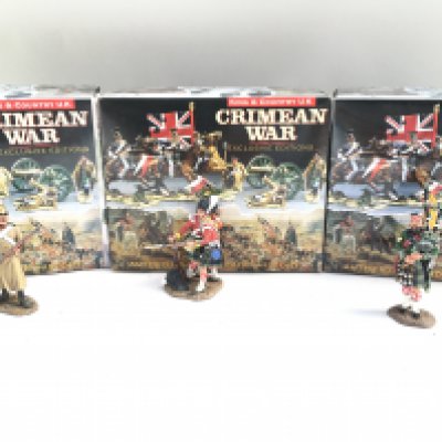 3 X Boxed King And Country Crimean Figures.A Russian Standing Loading. Helping A Friend And Highlander Piper.(3)