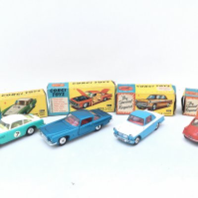 4 X Boxed Corgi Vehicles. A Aston Martin Comp #309. A Ghia L.6.4 #241. A Triumph Herald Coupe #231 And A Heinkel Economy Car #233.