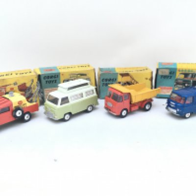 4 X Boxed Corgi Vehicles. A Land-Rover Breakdown Truck #427. A Ford Thames Airborne Truck #420. An E.R.F. Model64G #458 And A Commer Police Van #464.