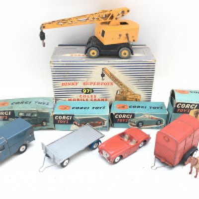 4 Boxed Corgi Vehicles and a Dinky Coles Mobile Crane. Boxes And Vehicles aim Various States.