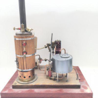A Steam Engine On Wooden Plinth. Approx Height 45CM.