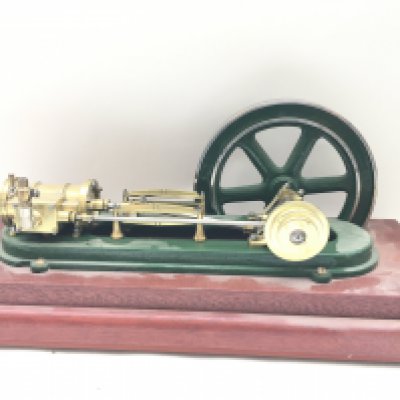 A Vertical Live Steam Engine On Wooden Plinth. Approx Height 24Cm length 58CM.