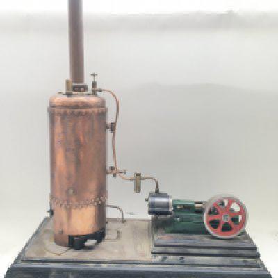 A Model Stuart Steam Boiler On Plinth Base. Approx Height 63CM And Length 53CM.