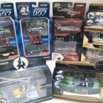 A Collection of Boxed Corgi James Bond Cars. And James Bond Shell Collection.