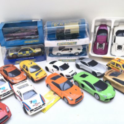 A Collection of Boxed And Loose Scalextric Cars.