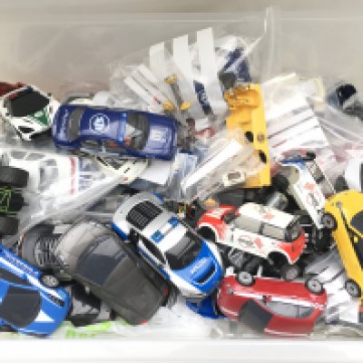 A Box Containing Scalextric Cars and Spare Parts.