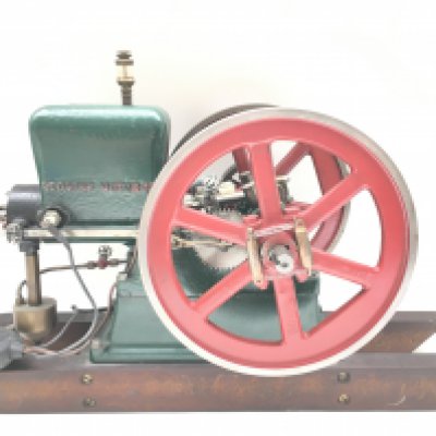 A Red Wing Twin Flywheel Model Patrol/Gasoline Engine. Fitted With Buzz Coil Ignition.