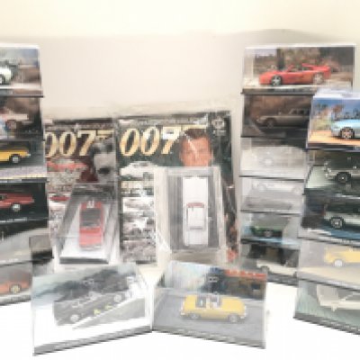 A Box Containing Part of The James Bond Car Collection And part Of the Batman Automobile Car Collection.