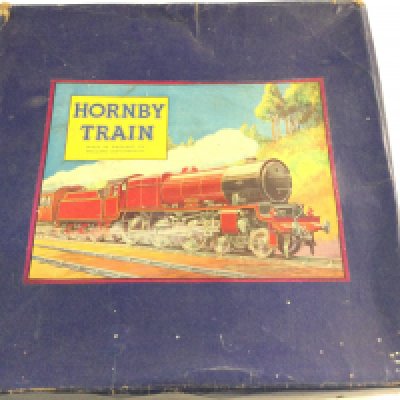 A Boxed 0 Gauge Hornby Clock Work Goods Train.