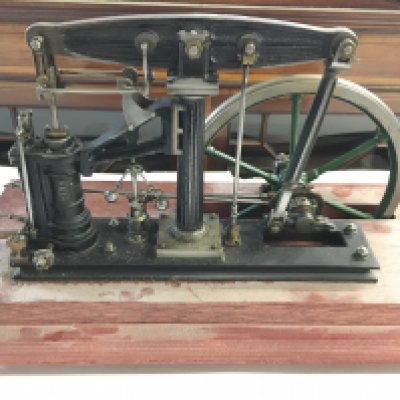 A Live Steam Beam Engine on Wooden Plinth With 9 inch Flywheel.