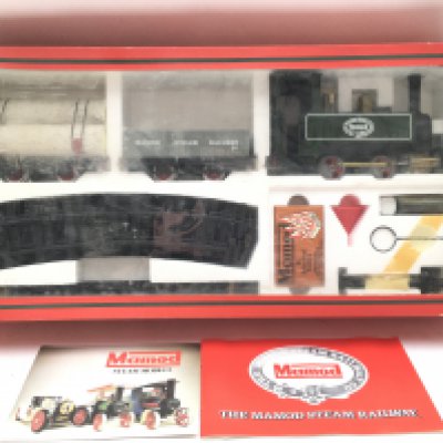A Boxed Mamod 0 Gauge Tank Engine. Track. Accessories And Instructions. In Unused Condition.
