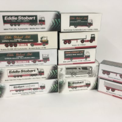 A collection of 12 boxed model trucks all in Eddie Stobart livery some sealed. No reserve