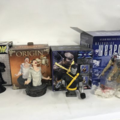 A collection of 4 boxed Marvel superhero sculptures including. Havok..Origin Rust..XMen Colossus..Wolverine WeaponX. No reserve