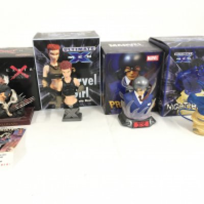 A collection of 4 boxed Marvel superhero sculptures including Logan..Marvel Girl..Professor X. and Nightcrawler. No reserve.