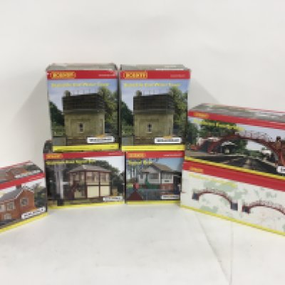 A collection of 7 boxed OO scale railway buildings by Hornby. No reserve