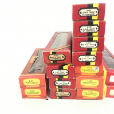 A collection of 15 boxed model railway coaches by Hornby 00 gauge. No reserve.