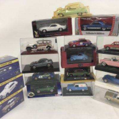 A collection of 18 boxed diecast model cars by Atlas..Solido etc. no reserve