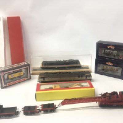A collection of 7 model railway 00 gauge items by Lima..Hornby..Bachmann..Dapol etc. includes 2 locomotives. No reserve