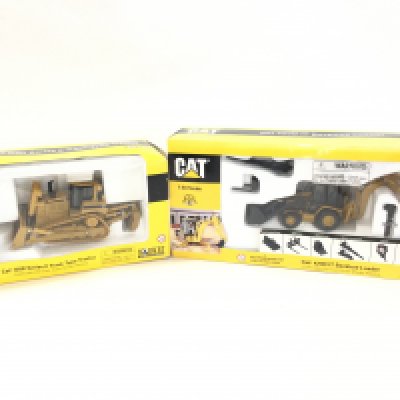 A Boxed Norscot Cat Series II Track-Type Tractor. A Cat 420D Backhoe Loader And A Cat B25 Lift Truck.