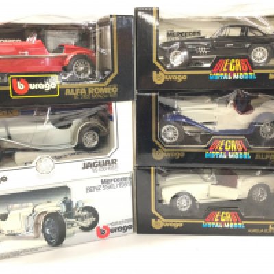 A Collection of 6 Boxed Burago Diecast Cars 1/18 Scale.