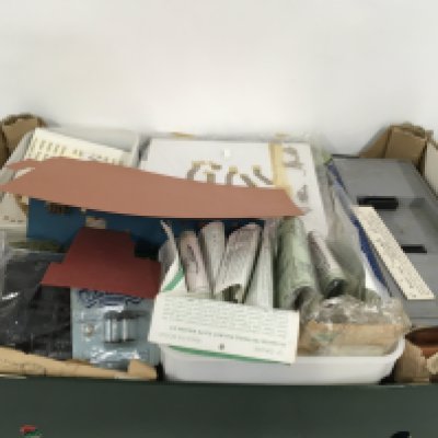 A box containing a large varied selection of model railway accessories and kits. Has N..O and OO gauge pieces. No reserve