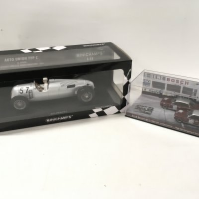 Two boxed model cars including by minichamps a Auto Union TYP C H . Stuck. 1936. Also by Replicar Ford Escort mk1 1300 GT. BROADSPEED. 1968 Nurburgring 6 hours class winners. No reserve.