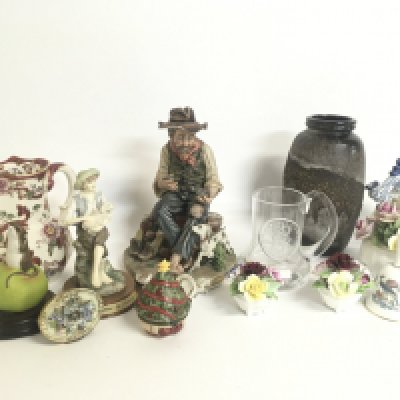 A collection of assorted ceramics including a Wedgwood bell, Royal Doulton posy vases, German art vase etc