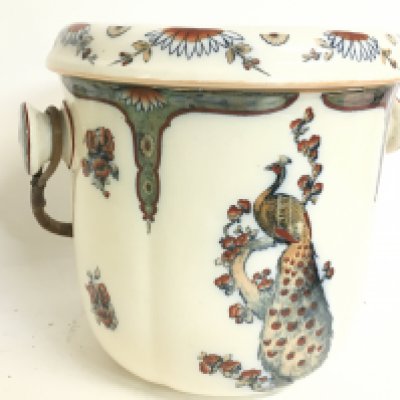 A large Victorian ceramic pail decorated with peacocks 18.5 tall 33cm wide. This lot cannot be posted