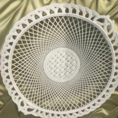 A Belleek dish fitted in original box .