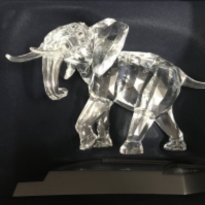 A cased Swarovski limited edition Elephant with stand. 01962/10000, together with Certificate of Authenticity. No obvious damage or restoration