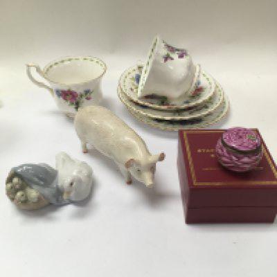 A mixed lot of ceramics including part of a royal Albert tea set, a Beswick pig figure A Lladro figure and an Staffordshire enamel pot.