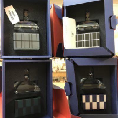 Four boxed Swarovski lidded trinket boxes, of geometric design. With Certificate in external boxes