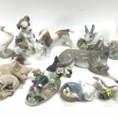 A collection of Lladro porcelain animal figures. (14). Postage not avaliable for this lot.
