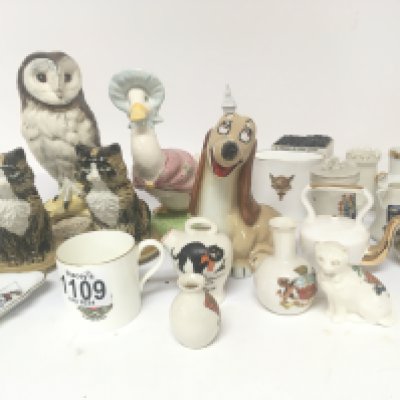 Wade blow up figure Beswick figures and crested porcelain ornaments.