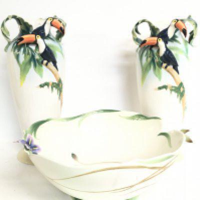 Two large Franz porcelain Toucan vases (42cm tall) and a floral design Franz Hummingbird bowl (35cm in diameter) , this lot cannot be posted