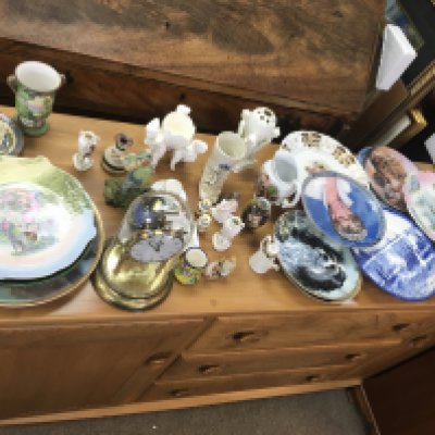 A collection of assorted ceramics including plates vases etc and a clock.
Postage D
