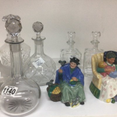 Two Royal Doulton figures Tuppence a bag and Sweet Dreams and a quantity of glass decanters.