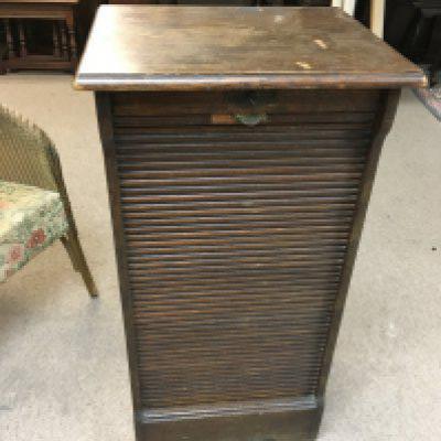 An early 20th century tambour oak cabinet 90cm tall