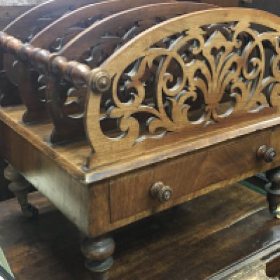 A walnut Canterbury, dimensions 36x50x46cm. This lot cannot be posted