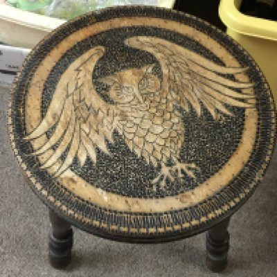 An oak wood stool with carved owl design, 37cm tall.