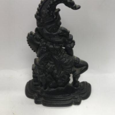 Two cast iron door stoppers.